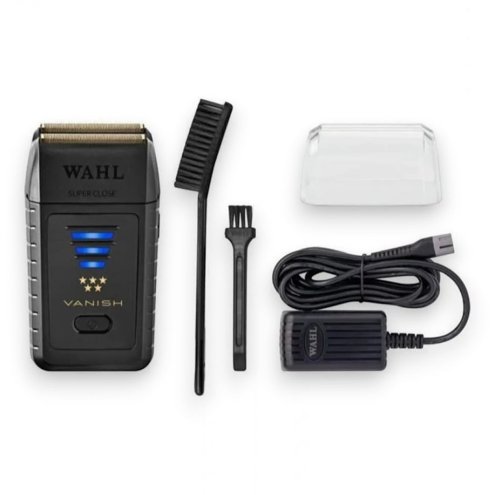 Said Salem Wahl Vanish men's smoothing shaver with cleaning brushes, protective cap, and power cord.