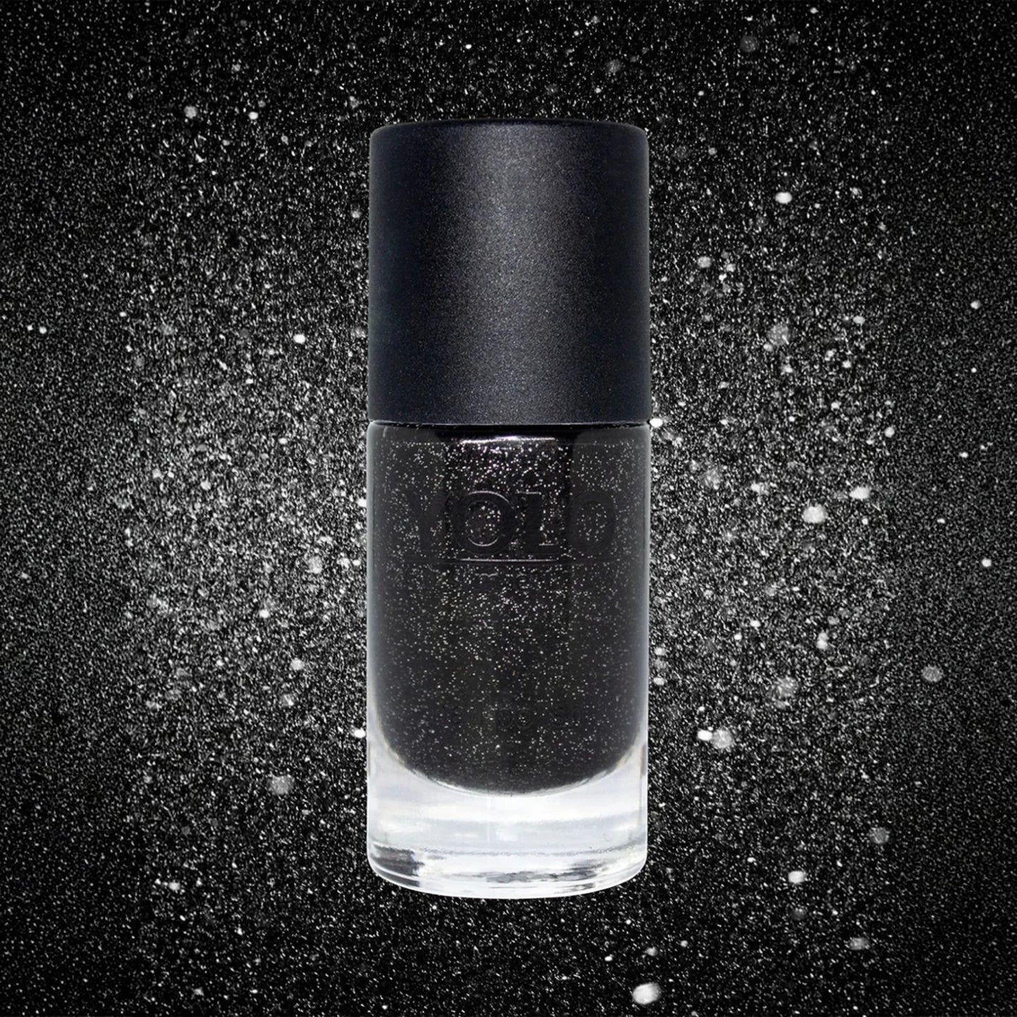 Said Salem YOLO BLACK nail polish in a glass bottle with a matte black cap against a sparkling dark background.