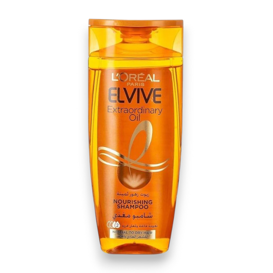 Said Salem L'Oreal Elvive Extraordinary Oil nourishing shampoo bottle for dry hair in a transparent amber container.