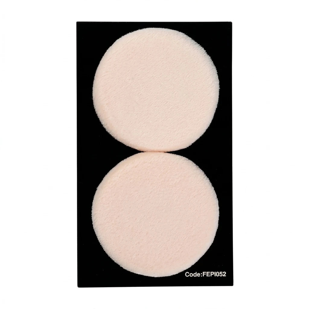 Said Salem Fe Foundation Spong set featuring two round, soft beige makeup sponges on a black display card