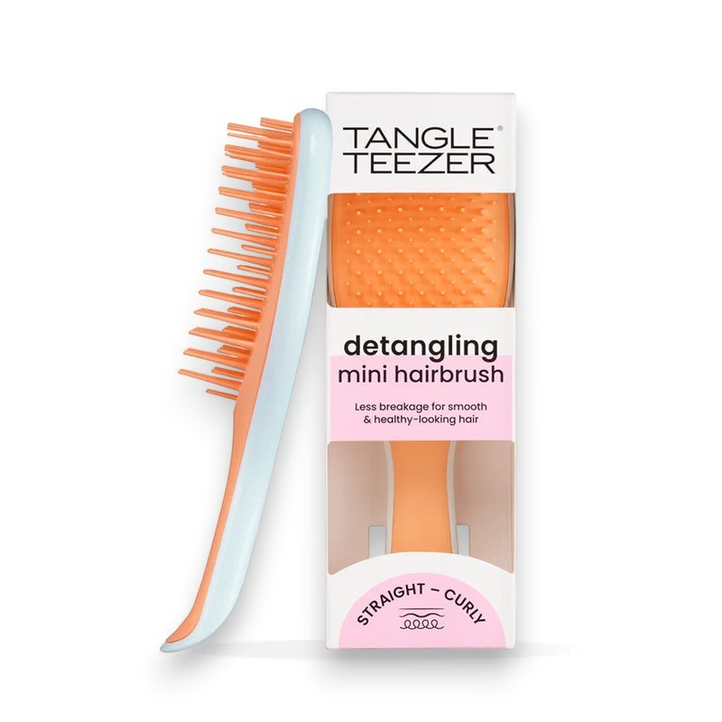 Said Salem Tangle Teezer Mini Ultimate Detangler hairbrush in sweet orange and ice blue with two-tiered teeth.