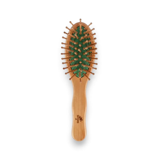 Said Salem Wessen wooden hairbrush with gentle detangling pins and a green cushion base for everyday hair care.