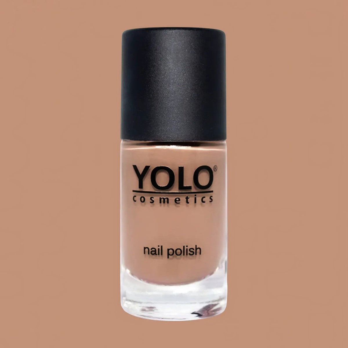Said Salem YOLO Beige nail polish in a glass bottle with a black cap, featuring a neutral, creamy beige lacquer.