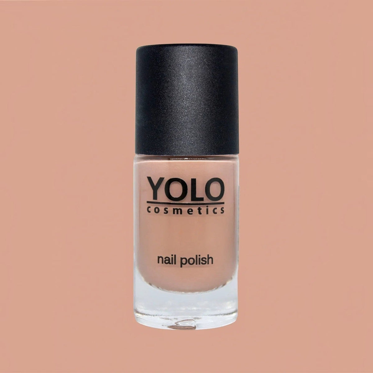 Said Salem YOLO Beige nail polish in a clear glass bottle with a black cap, featuring a neutral, creamy beige shade.