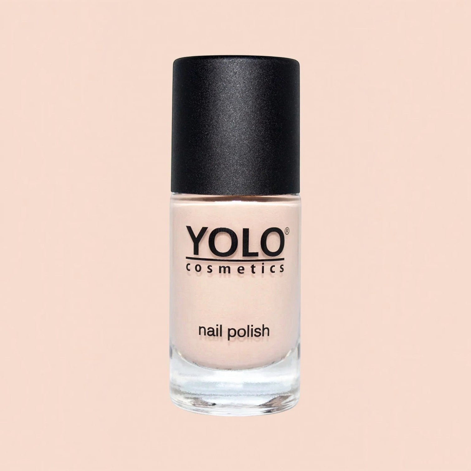 Said Salem YOLO Beige nail polish in a clear glass bottle with a black cap, featuring a neutral, creamy beige shade.
