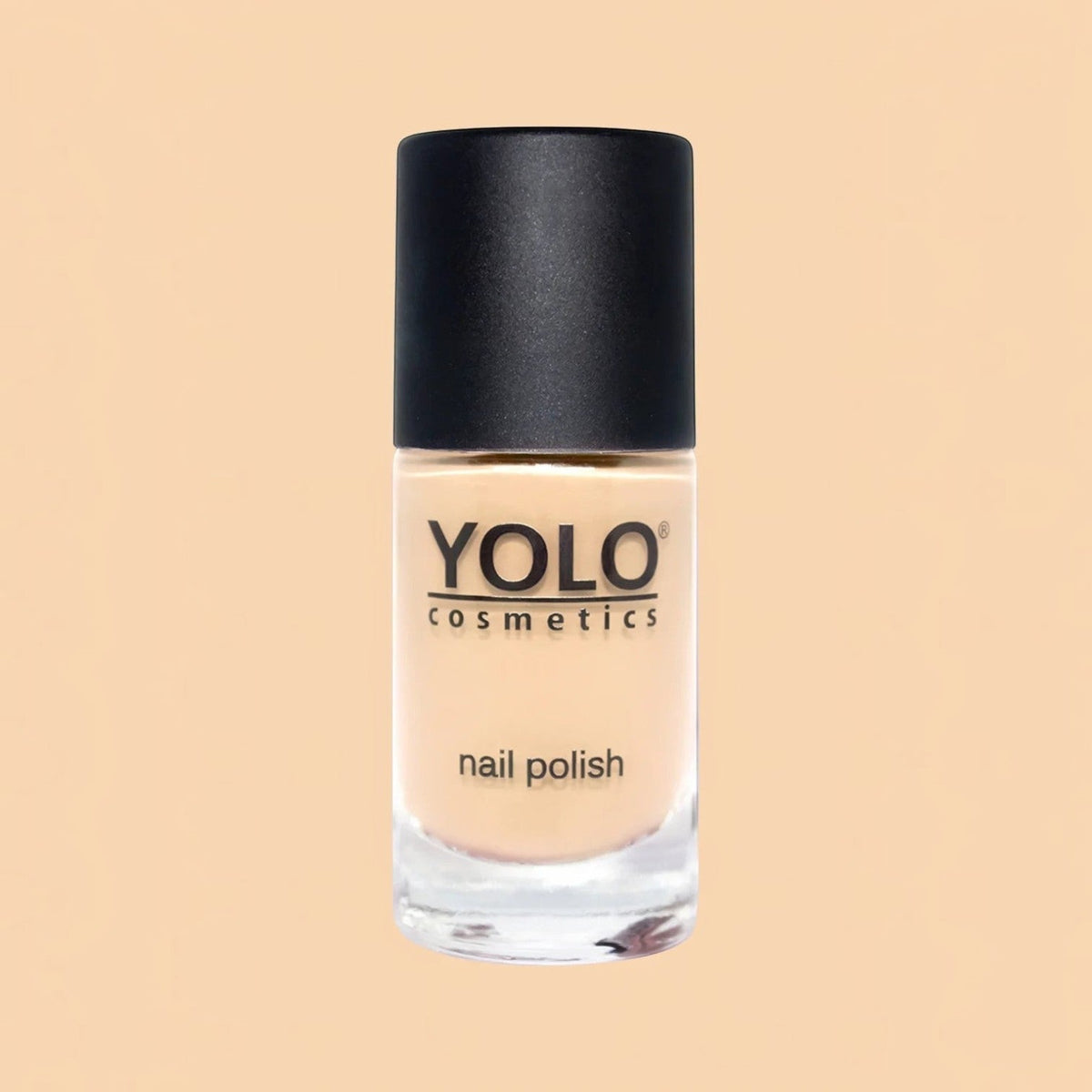 Said Salem YOLO Beige nail polish in a glass bottle with a black cap, featuring a neutral creamy beige lacquer.