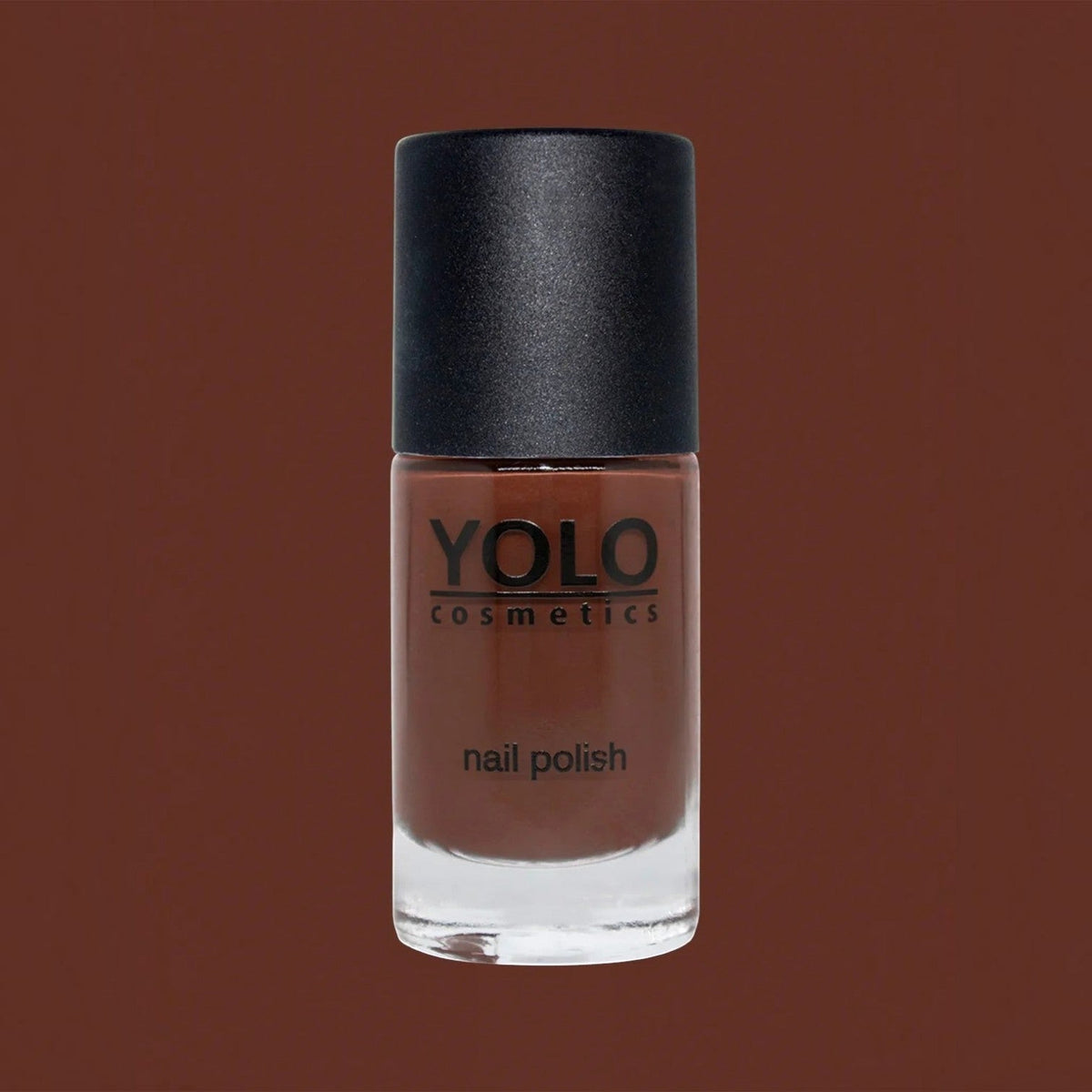 Said Salem YOLO Beige nail polish in a glass bottle with a black cap, featuring a rich, creamy brown lacquer.