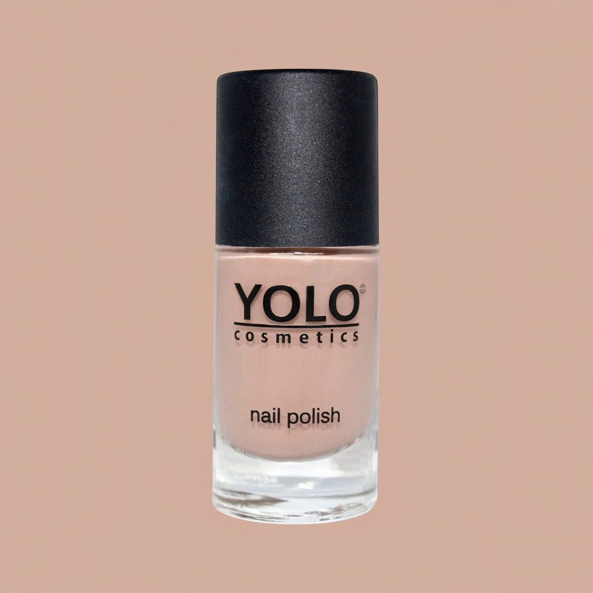 Said Salem YOLO Beige nail polish in a glass bottle with a black cap, featuring a neutral, creamy beige lacquer.
