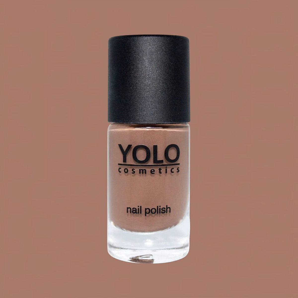 Said Salem YOLO Beige nail polish in a glass bottle with a black cap, featuring a neutral, creamy beige shade.