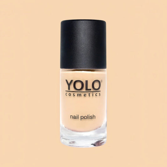 Said Salem YOLO Beige nail polish in a glass bottle with a black cap, featuring a neutral, creamy beige lacquer.