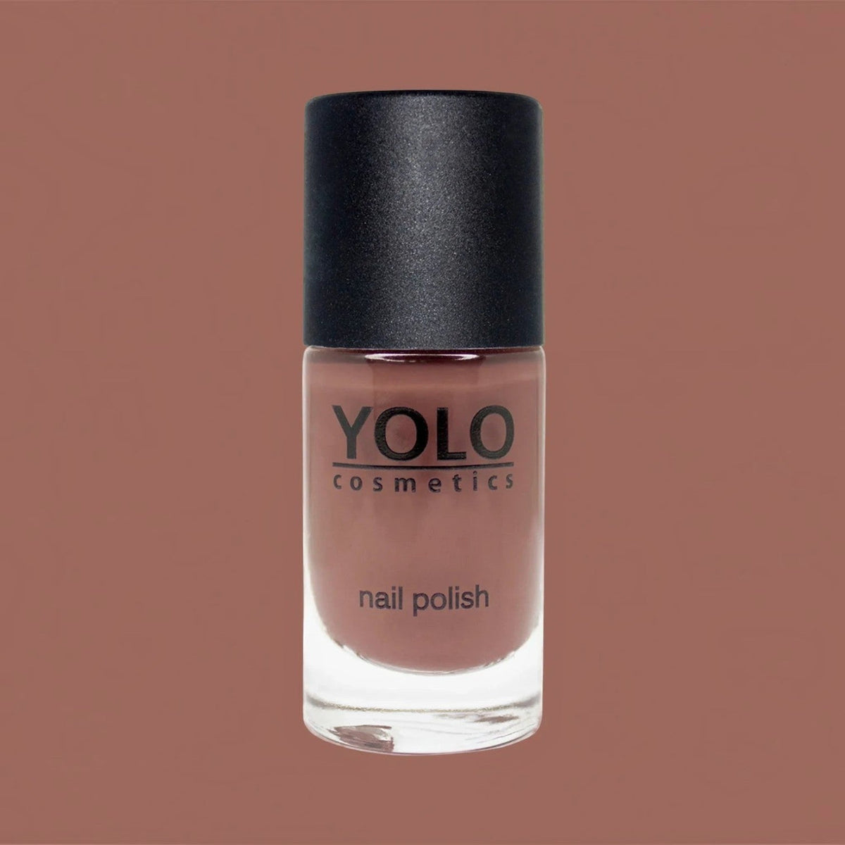 Said Salem YOLO Beige nail polish in a glass bottle with a black cap, featuring a neutral, creamy beige lacquer.