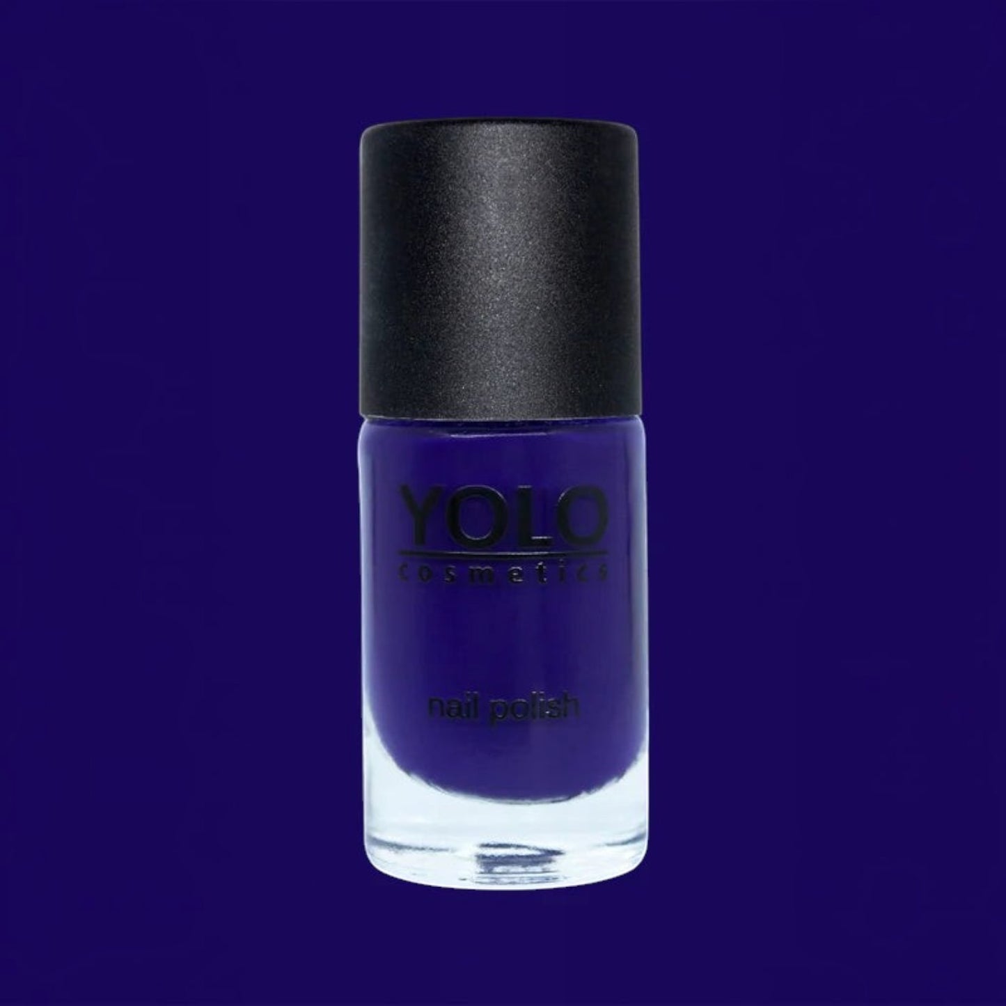 Said Salem YOLO Blue deep navy nail polish in a glass bottle with a black cap, providing a high-shine opaque finish.