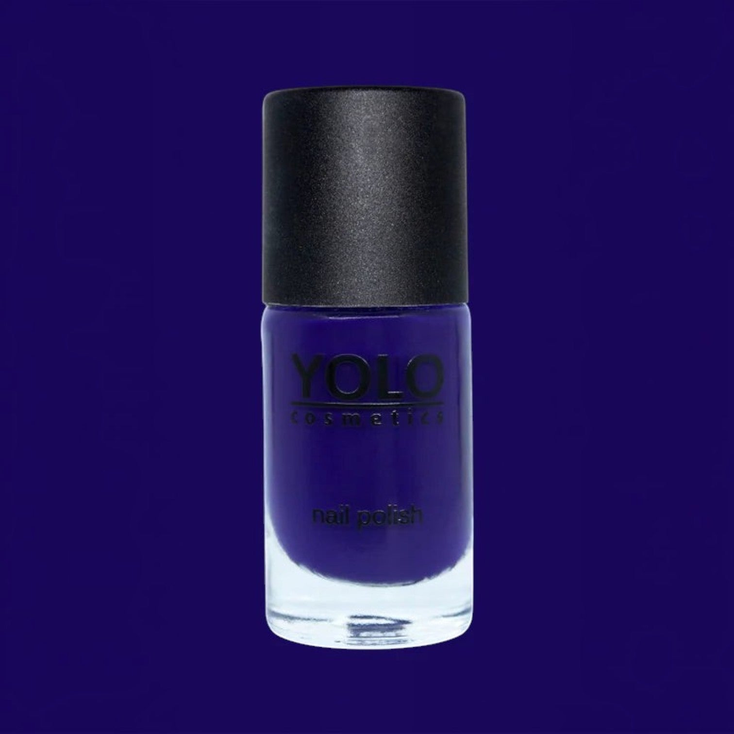 Said Salem YOLO Blue deep navy nail polish in a glass bottle with a black cap, providing a high-shine opaque finish.