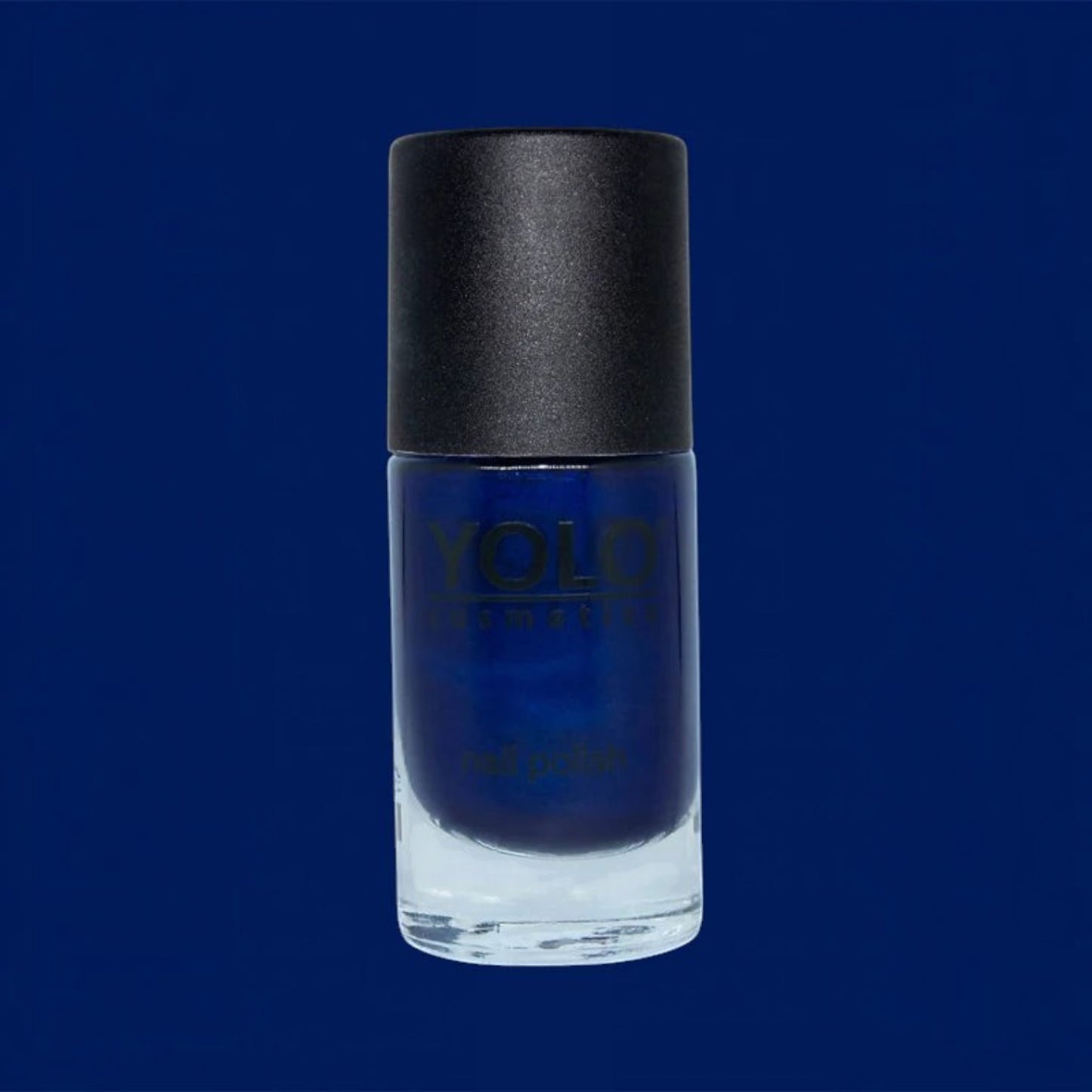 Said Salem YOLO Blue deep navy nail polish in a glass bottle with a black cap for a high-shine professional finish.