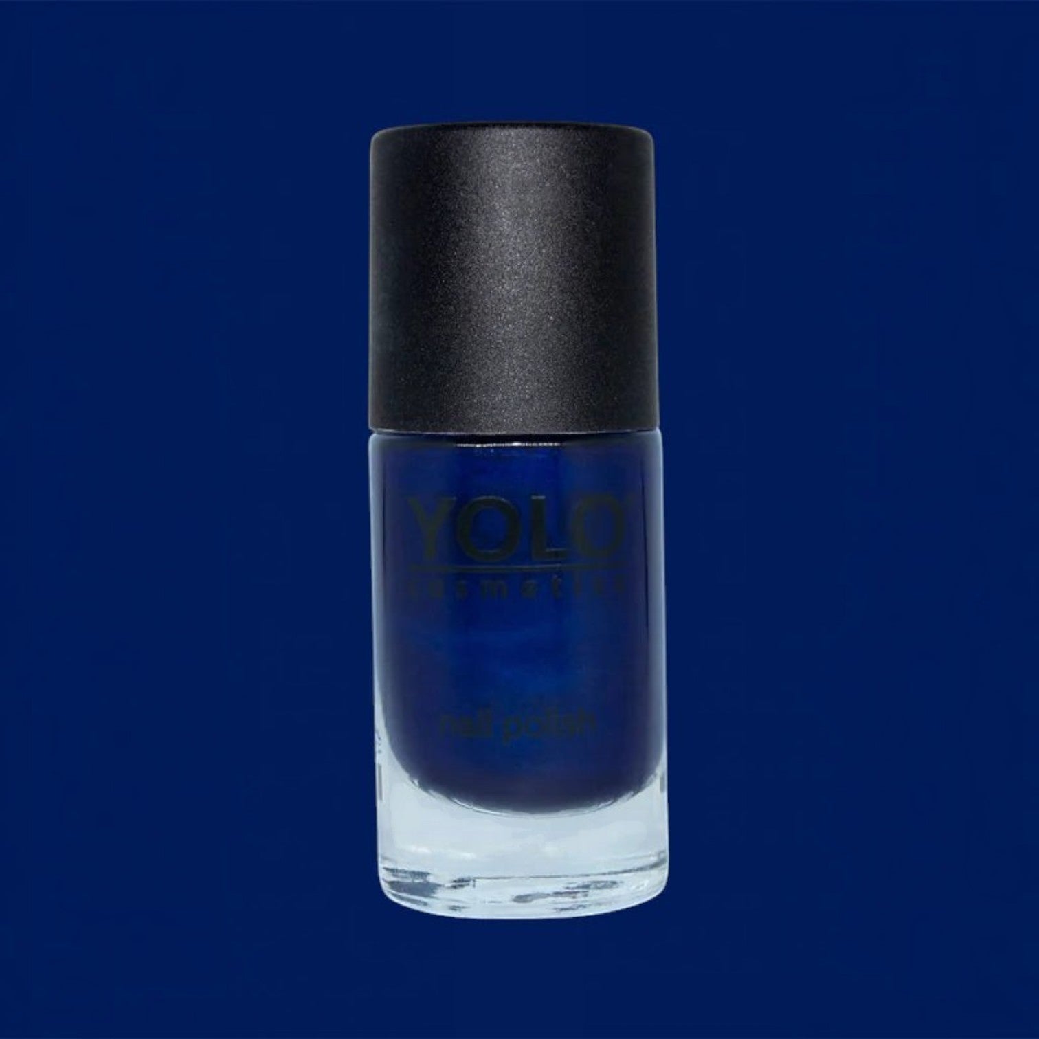 Said Salem YOLO Blue deep navy nail polish in a glass bottle with a black cap for a high-shine professional finish.