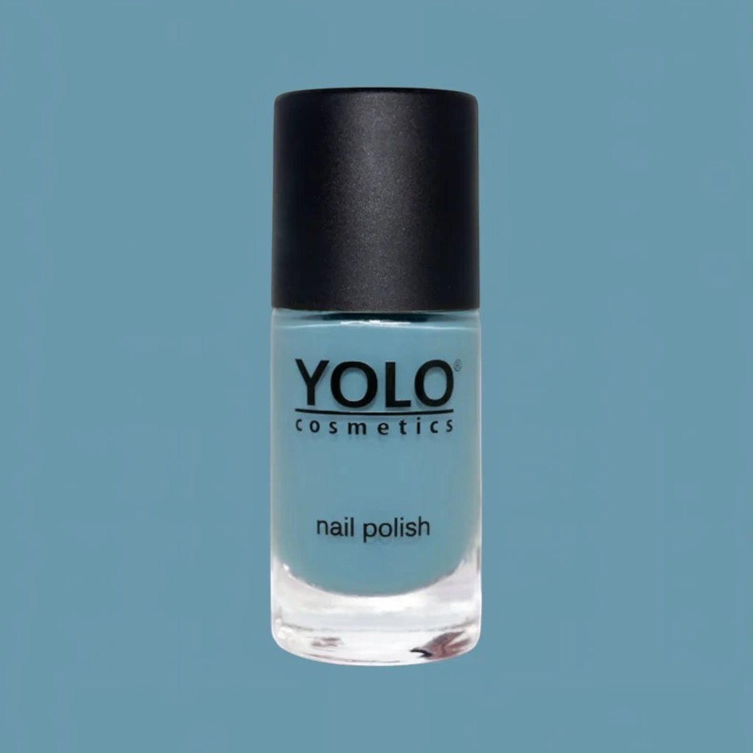 Said Salem YOLO Blue nail polish in a soft pastel sky blue crème finish with a black cap on a matching blue background