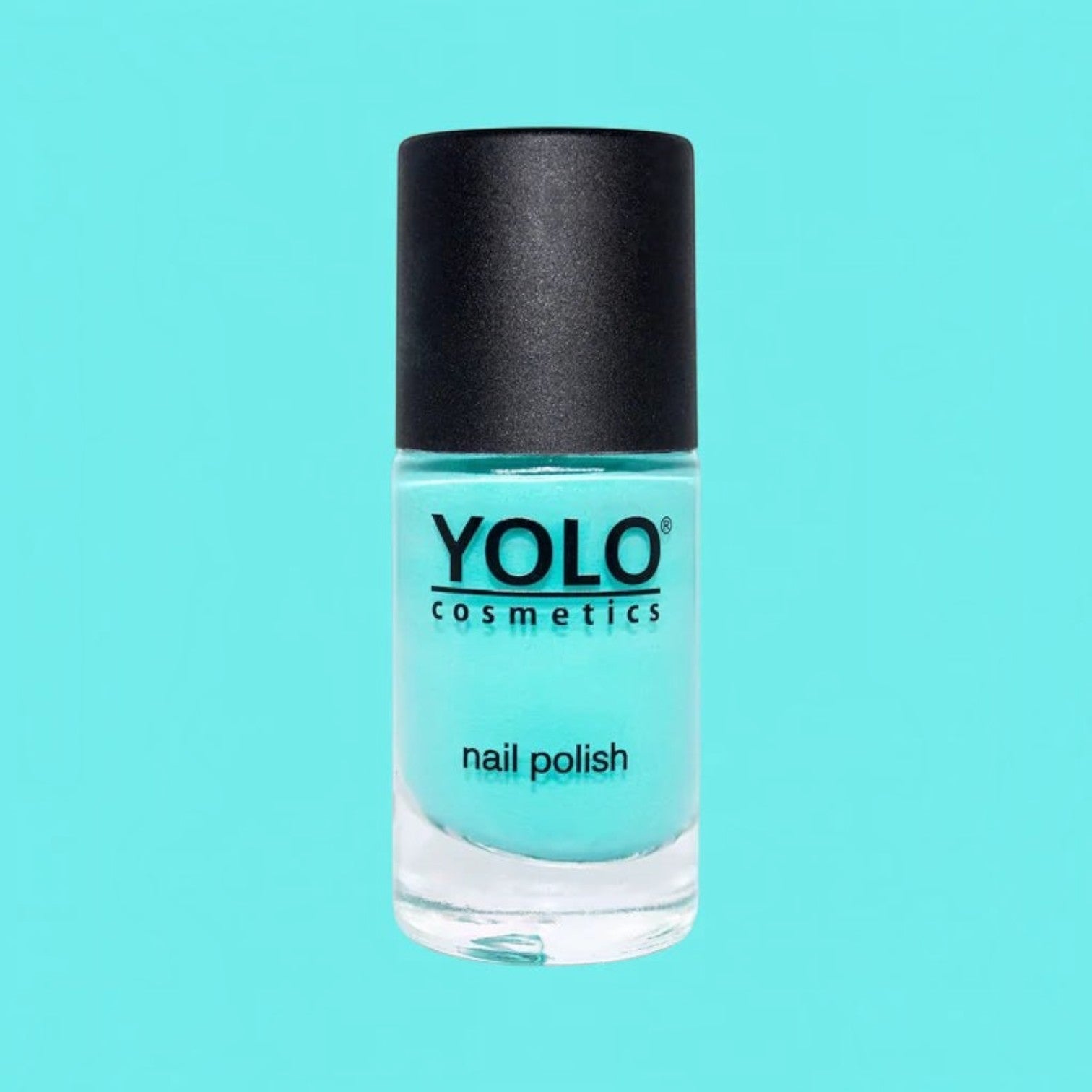 Said Salem YOLO Blue electric teal nail polish in a glass bottle with a black cap against a matching blue background.