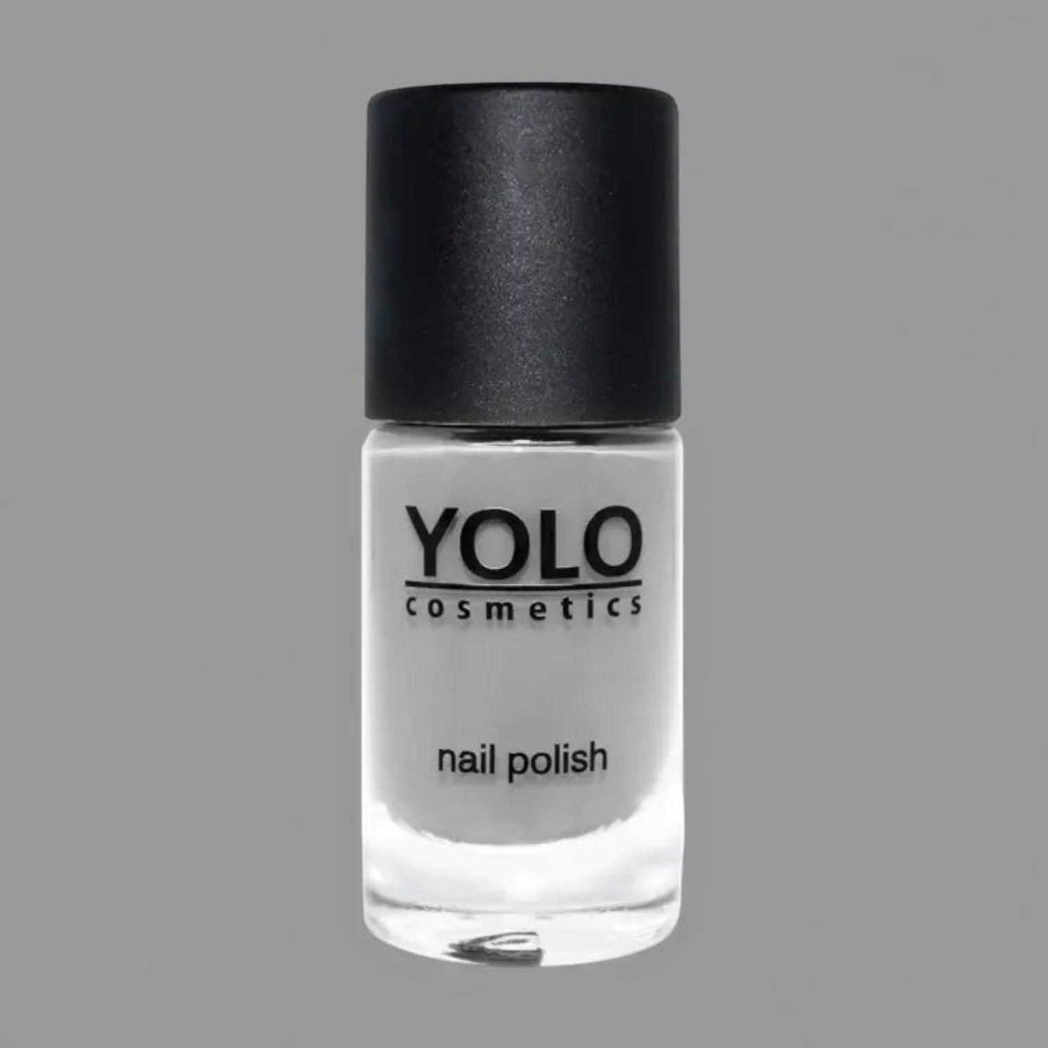 Said Salem YOLO Gray nail polish in a clear glass bottle with a black cap, featuring a modern minimalist design.
