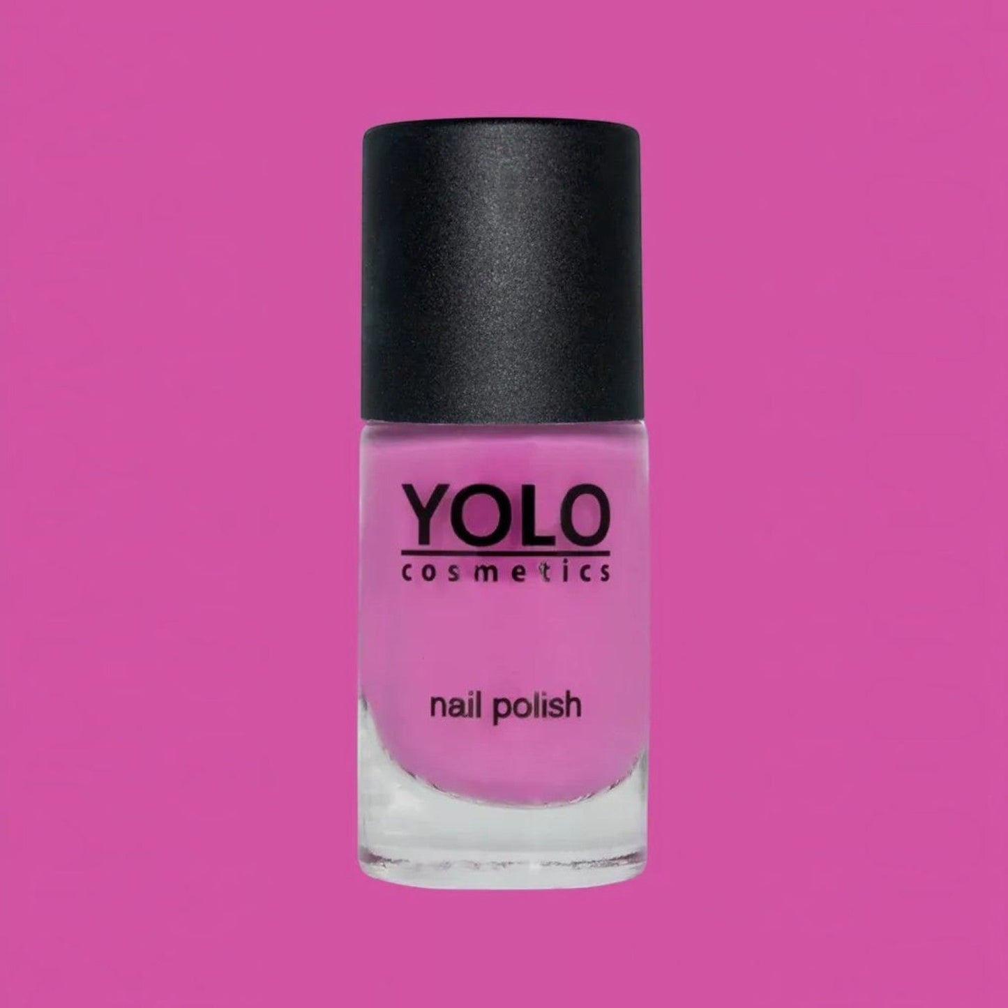 Said Salem YOLO Pink nail polish in a vibrant fuchsia shade with a black cap against a matching pink background.