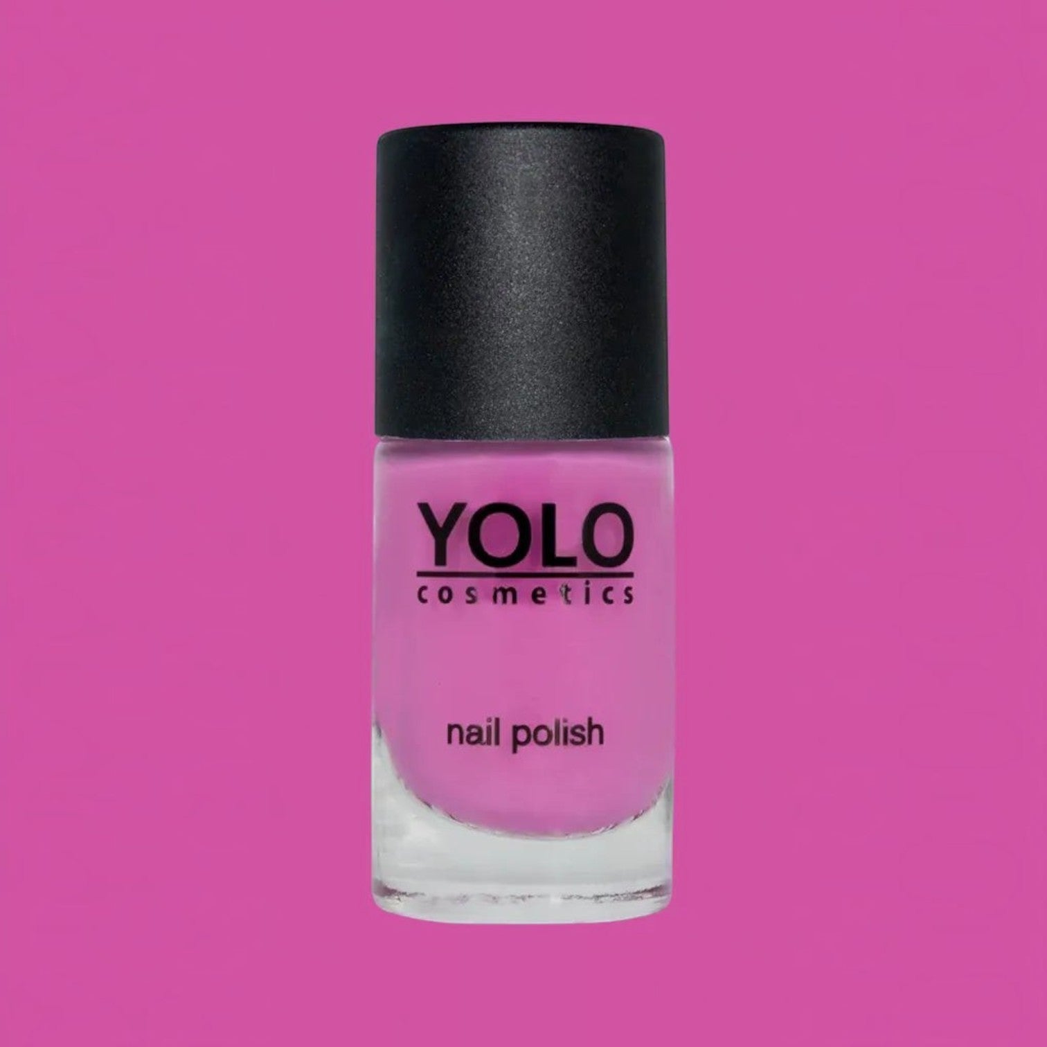 Said Salem YOLO Pink nail polish in a vibrant fuchsia shade with a black cap against a matching pink background.
