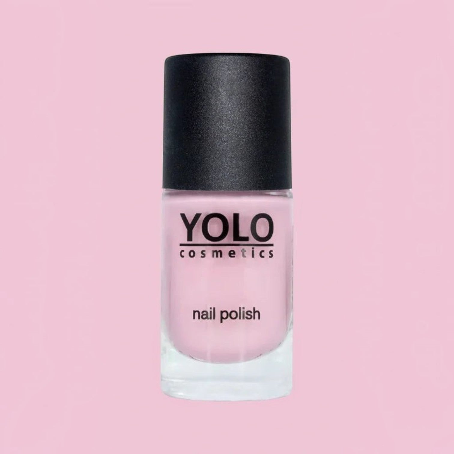 Said Salem YOLO Pink nail polish in a soft pastel shade with a black cap, presented in a clear glass bottle.