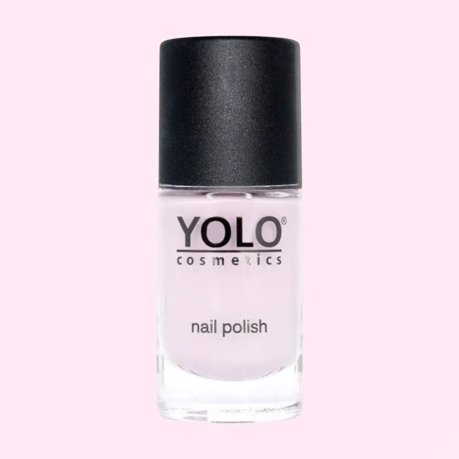 Said Salem YOLO Pink nail polish in a soft pastel shade with a black cap in a clear glass bottle.