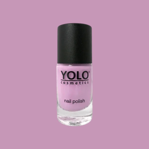 Said Salem YOLO Pink nail polish in a soft pastel shade with a black cap in a clear glass bottle