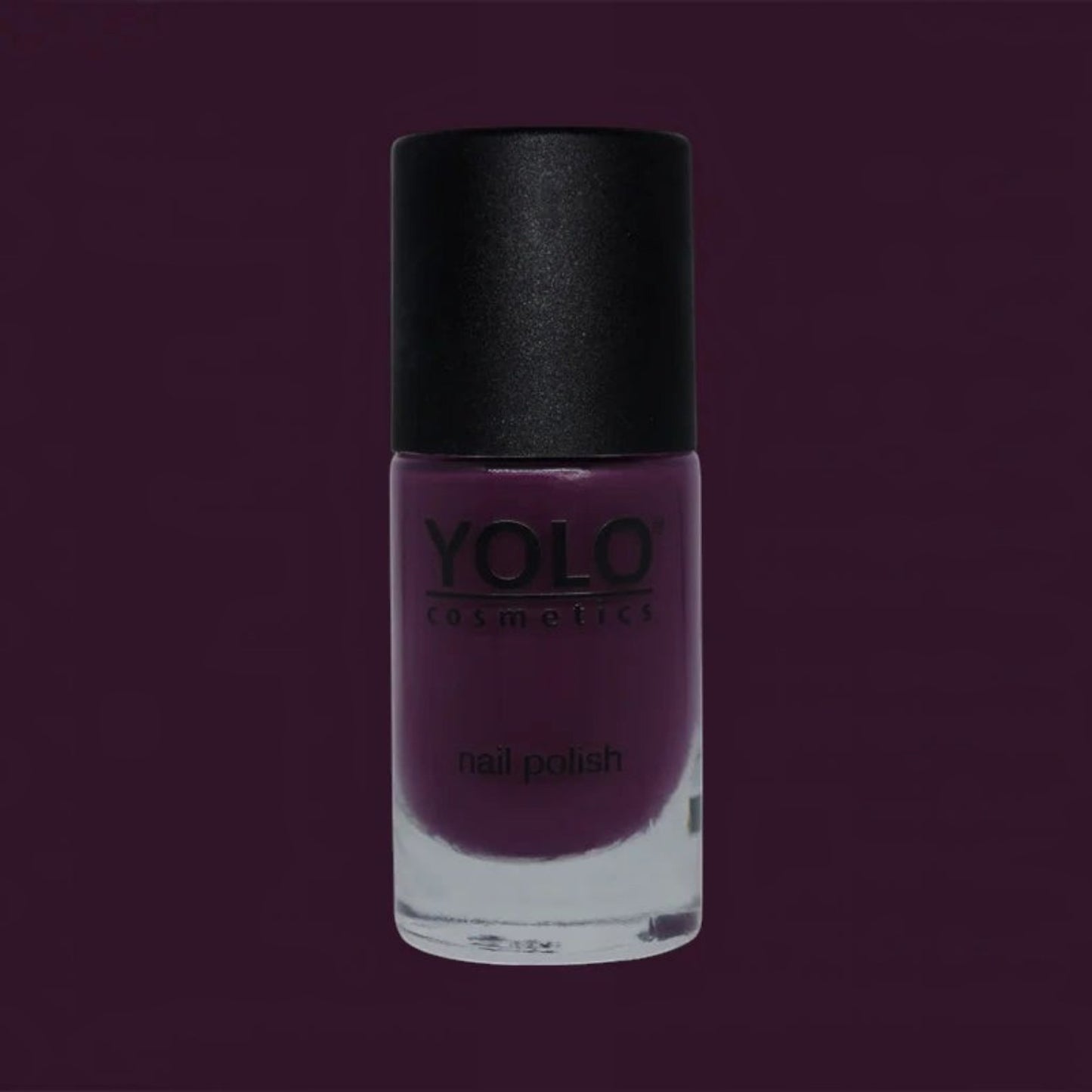 Said Salem YOLO Purple nail polish in a glass bottle with a black cap, featuring a deep, rich violet cream finish.