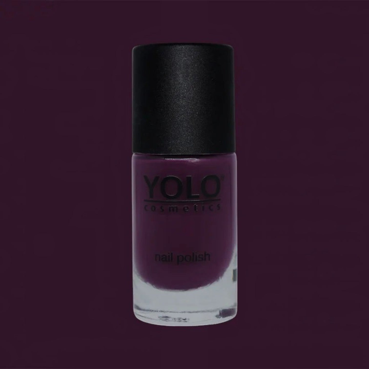 Said Salem YOLO Purple nail polish in a glass bottle with a black cap, featuring a deep, rich violet cream finish.