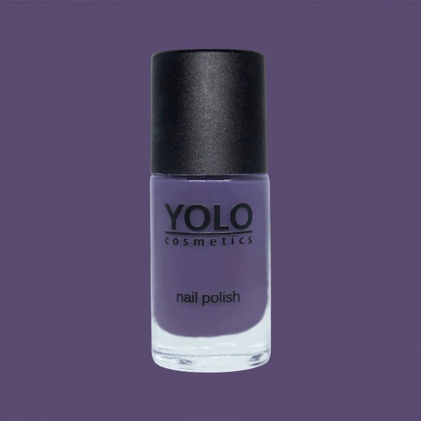 Said Salem YOLO Purple nail polish in a clear glass bottle with a black cap against a matching purple background.