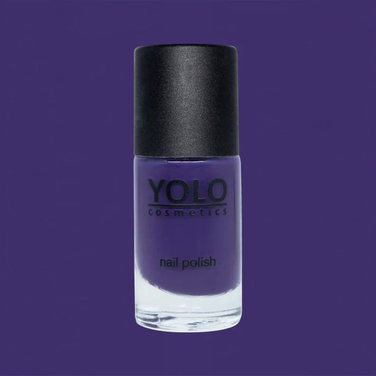 Said Salem YOLO Purple nail polish in a clear glass bottle with a black cap against a matching purple background.