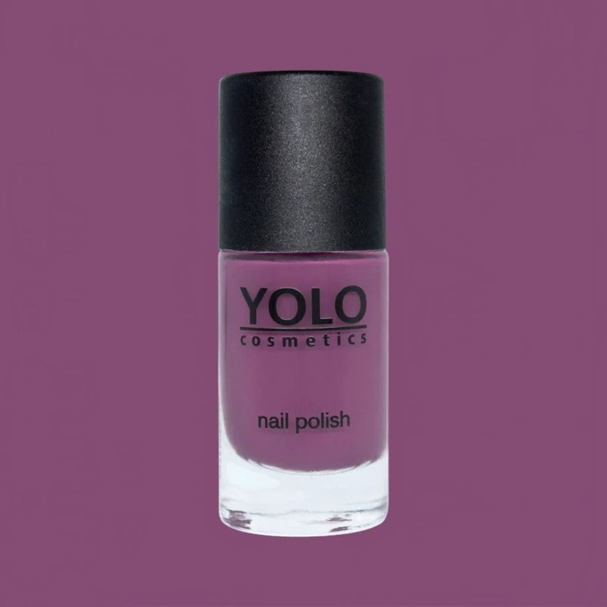 Said Salem YOLO Purple nail polish in a glass bottle with a black cap against a matching purple background