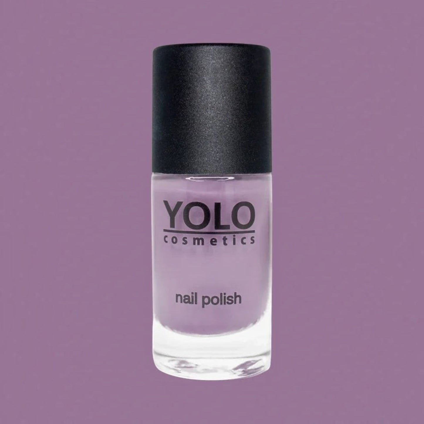 Said Salem YOLO Purple nail polish in a clear glass bottle with a black cap against a matching purple background