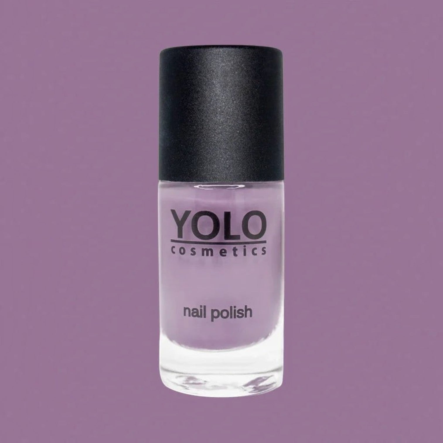 Said Salem YOLO Purple nail polish in a clear glass bottle with a black cap against a matching purple background