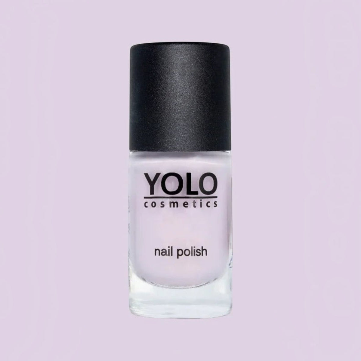 Said Salem YOLO Purple nail polish in a clear glass bottle with a black cap against a light purple background