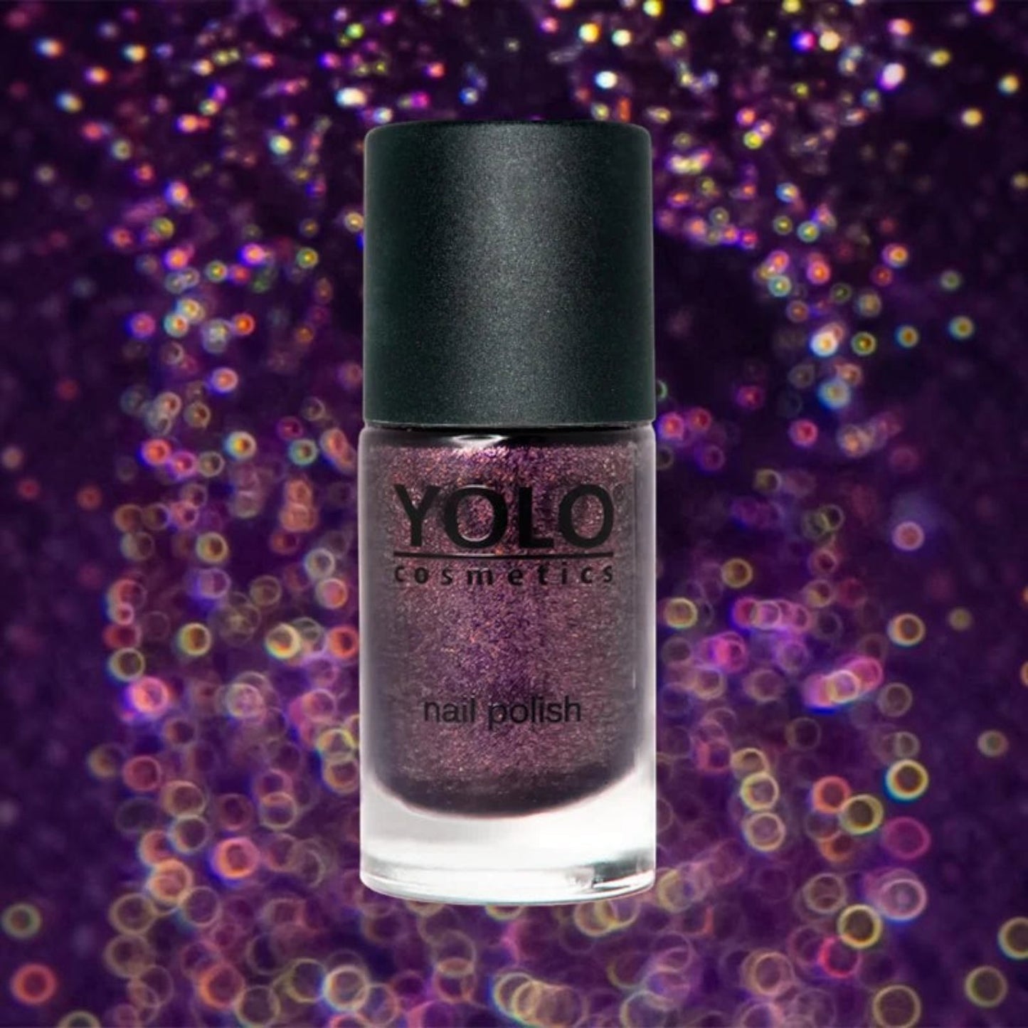 Said Salem YOLO Purple nail polish with a shimmering dark violet finish against a bokeh glitter background