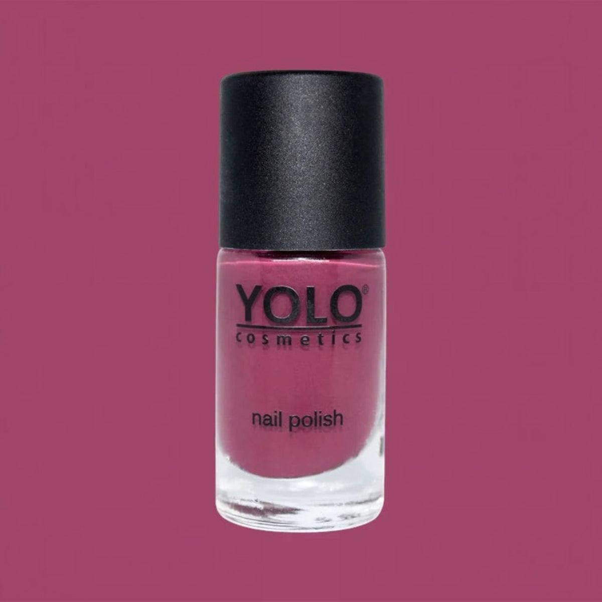 Said Salem YOLO Red nail polish in a sleek glass bottle with a black cap, featuring a vibrant, high-pigment red shade.