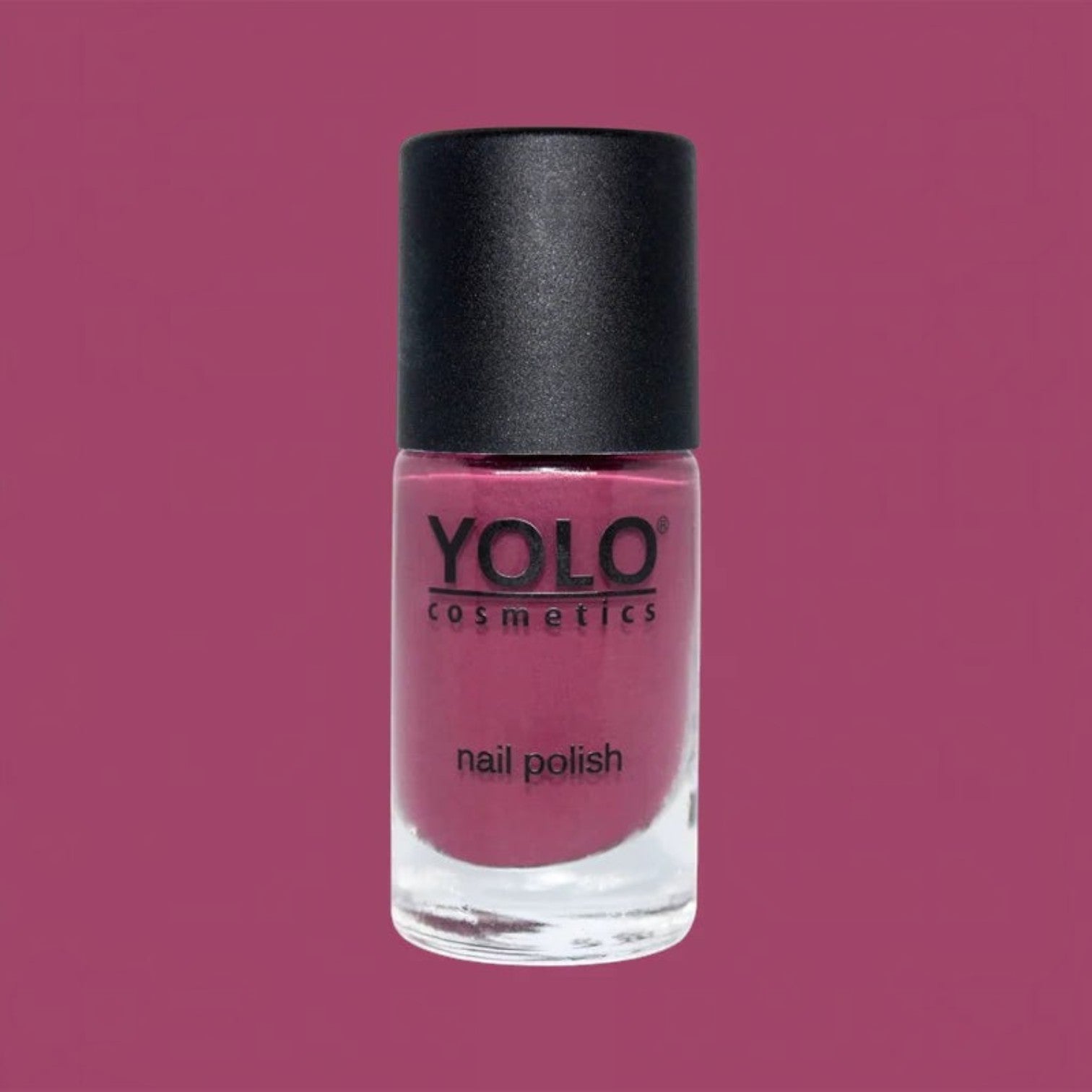 Said Salem YOLO Red nail polish in a sleek glass bottle with a black cap, featuring a vibrant, high-pigment red shade.