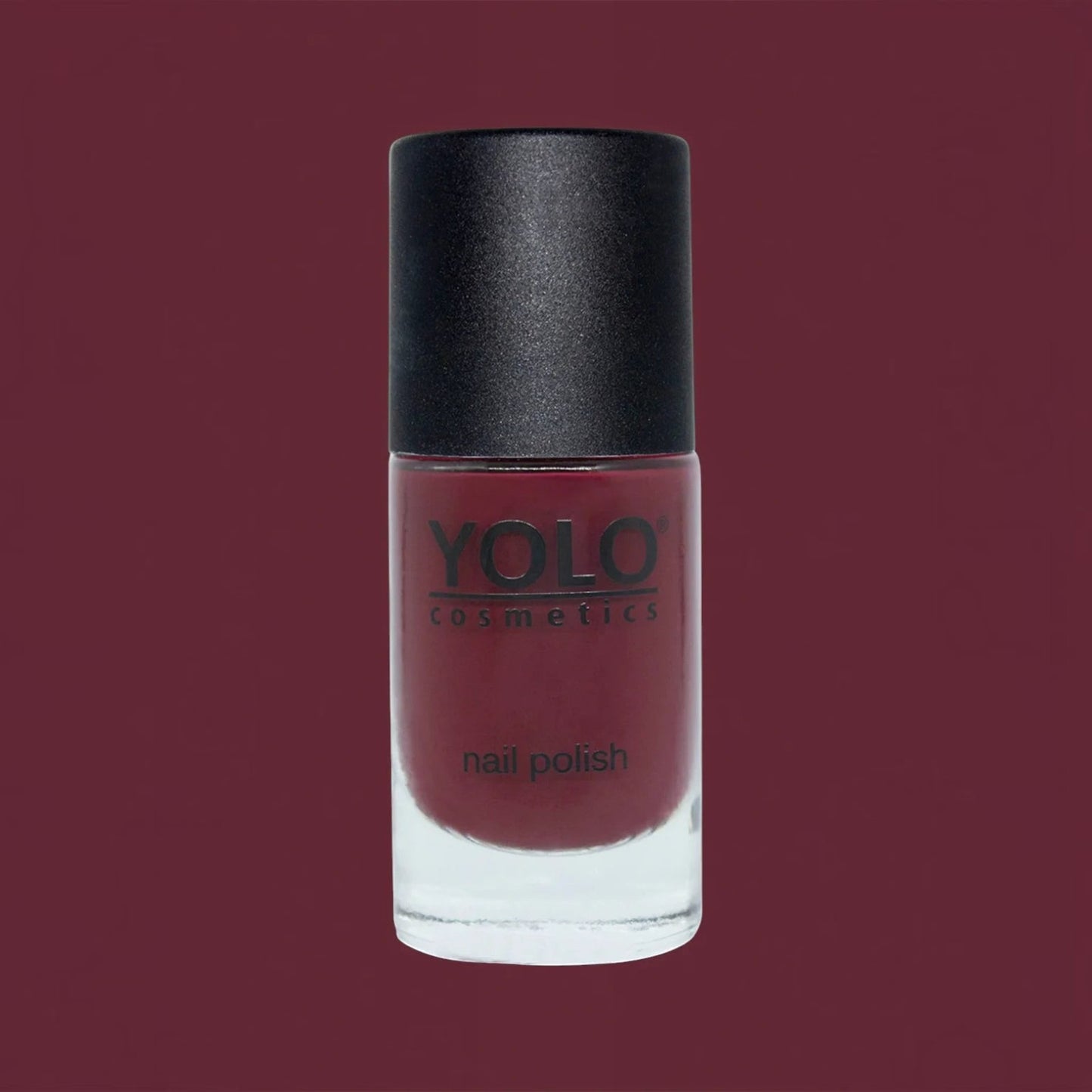 Said Salem YOLO Red nail polish in a sleek glass bottle with a high-shine, deep red, chip-resistant formula.