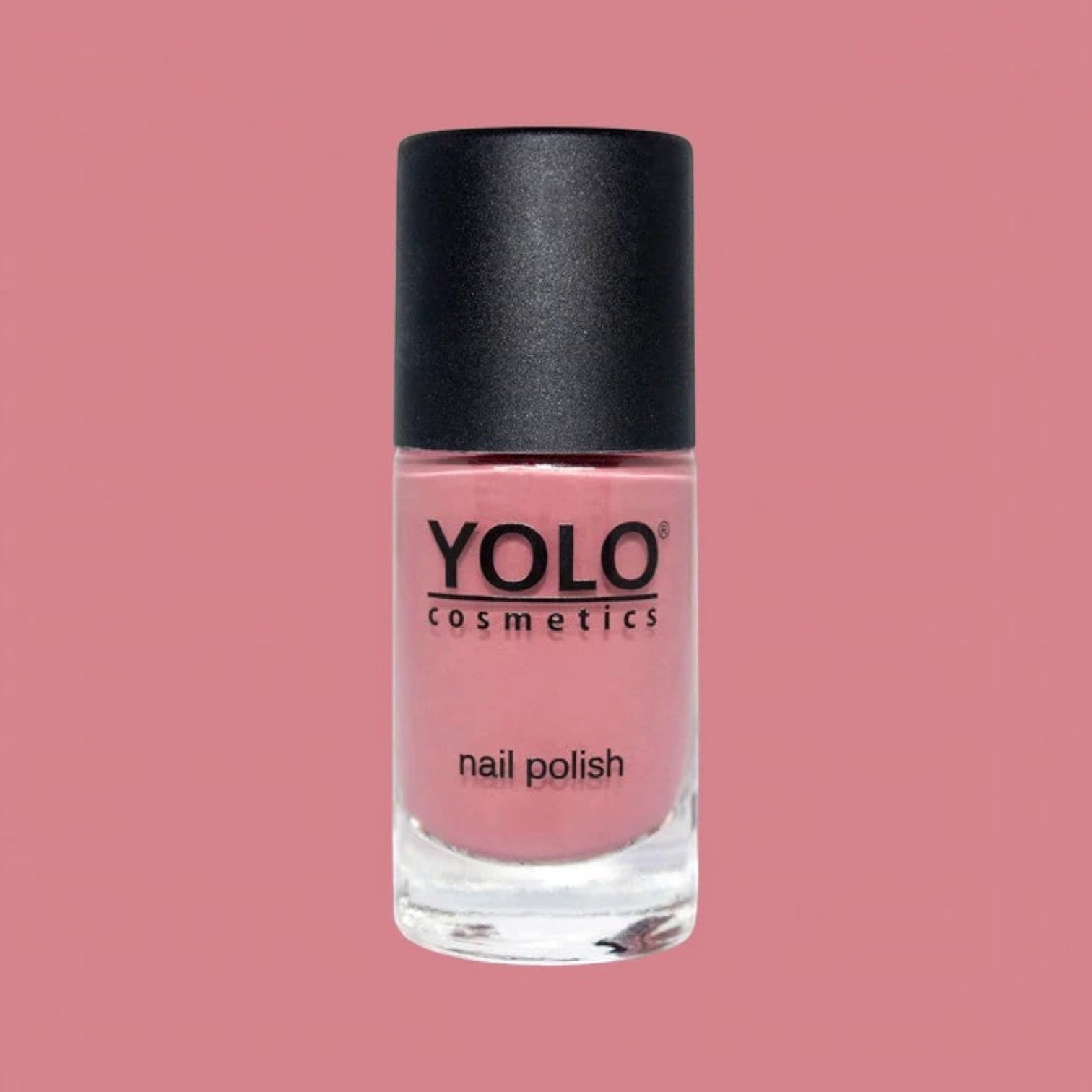 Said Salem YOLO Red nail polish in a sleek glass bottle with a black cap, featuring a vibrant, high-shine red finish.