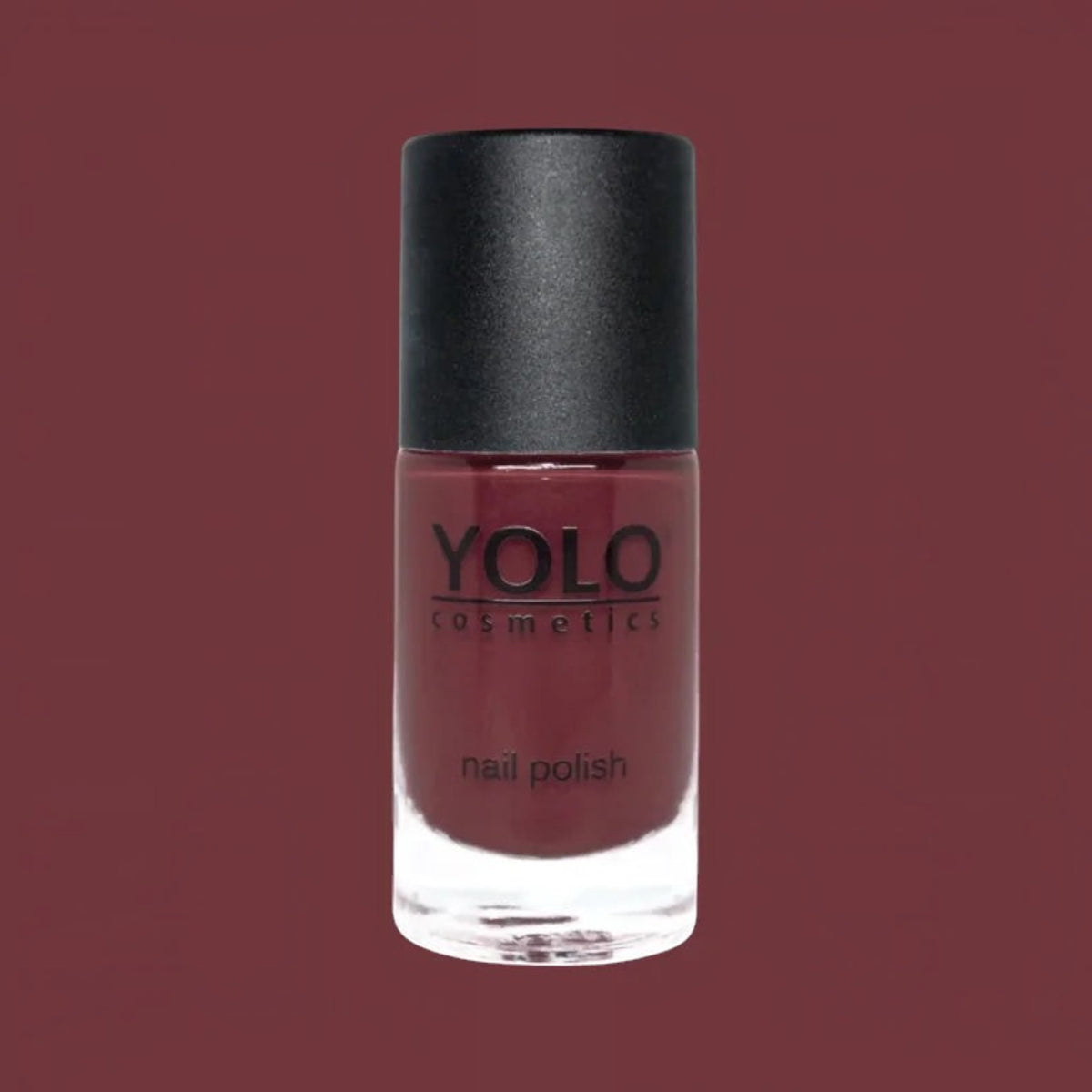 Said Salem YOLO Red nail polish in a sleek glass bottle with a black cap, featuring a deep, high-shine red pigment.