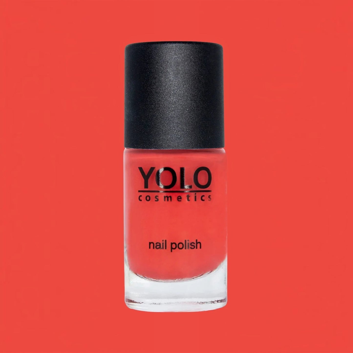 Said Salem YOLO Red nail polish in a glass bottle with a black cap, featuring a vibrant, high-shine classic red hue.