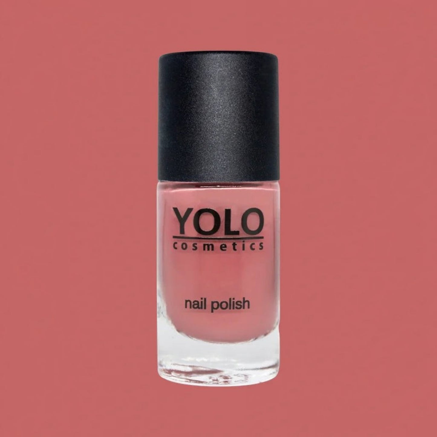 Said Salem YOLO Red nail polish in a sleek glass bottle with a black cap, featuring a vibrant high-shine red finish.