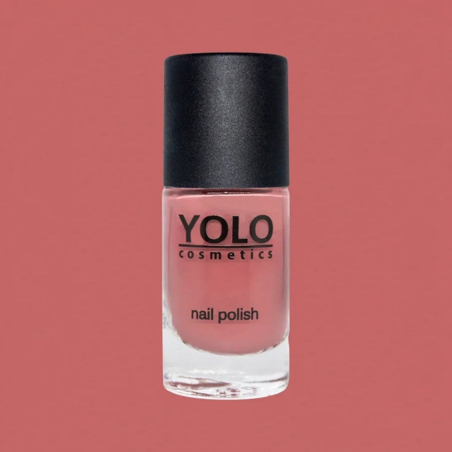 Said Salem YOLO Red nail polish in a sleek glass bottle with a black cap, featuring a vibrant high-shine red finish.